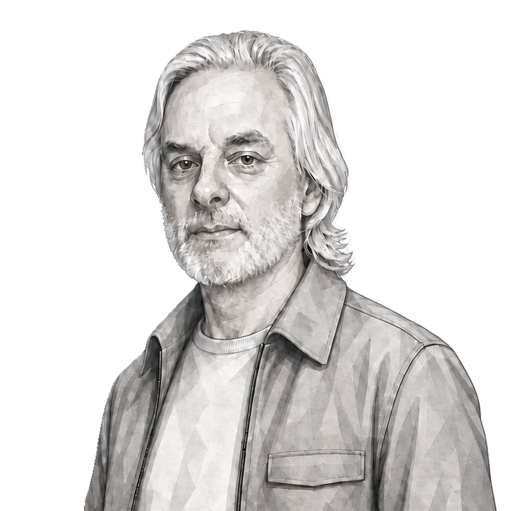 David Chalmers stands in a cool faceted grey jacket, carrying one muted-gold top-flip reporter's notebook low beside his hip.